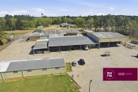 Aerial view of large commercial facility with multiple buildings